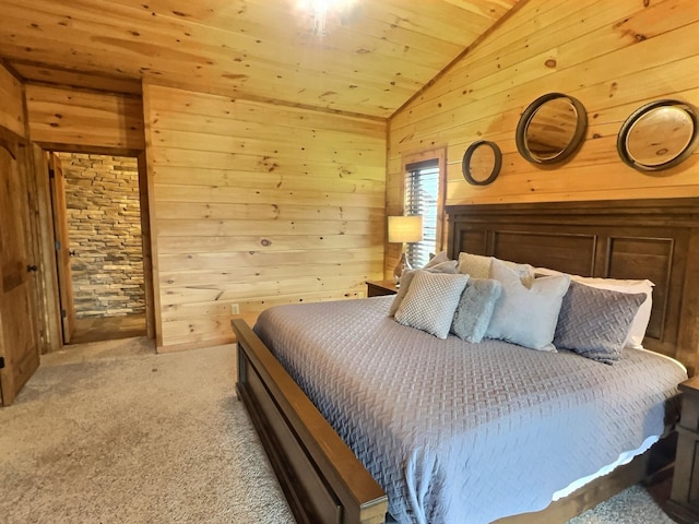 bedroom featuring lofted ceiling, wood walls, light colored carpet, and wood ceiling