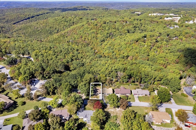 bird's eye view featuring a view of trees