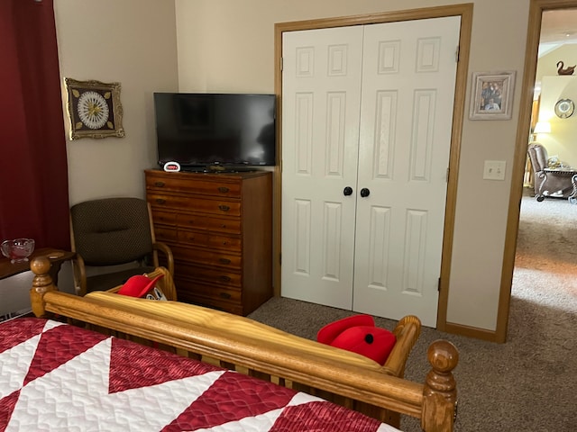 carpeted bedroom with a closet