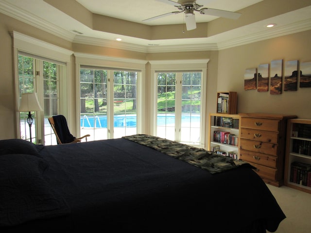 bedroom with access to outside, crown molding, multiple windows, and ceiling fan