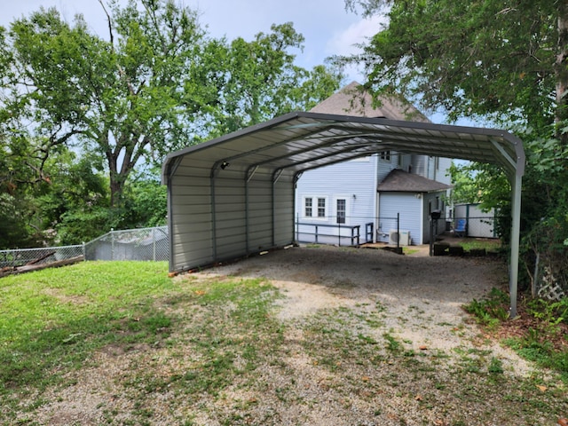 view of outdoor structure with a carport