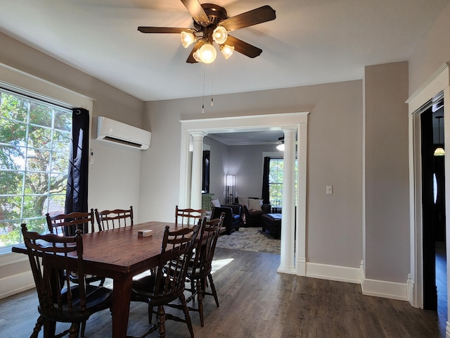 dining room with plenty of natural light, an AC wall unit, and decorative columns