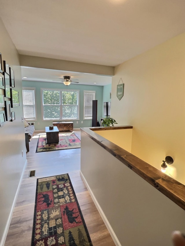 corridor featuring light hardwood / wood-style flooring