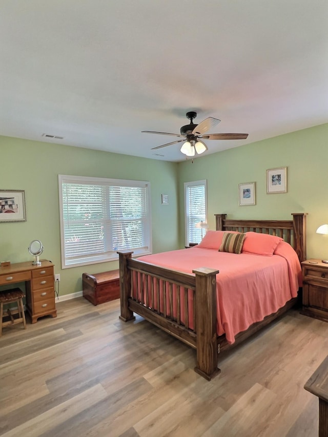 bedroom featuring ceiling fan and light wood-type flooring