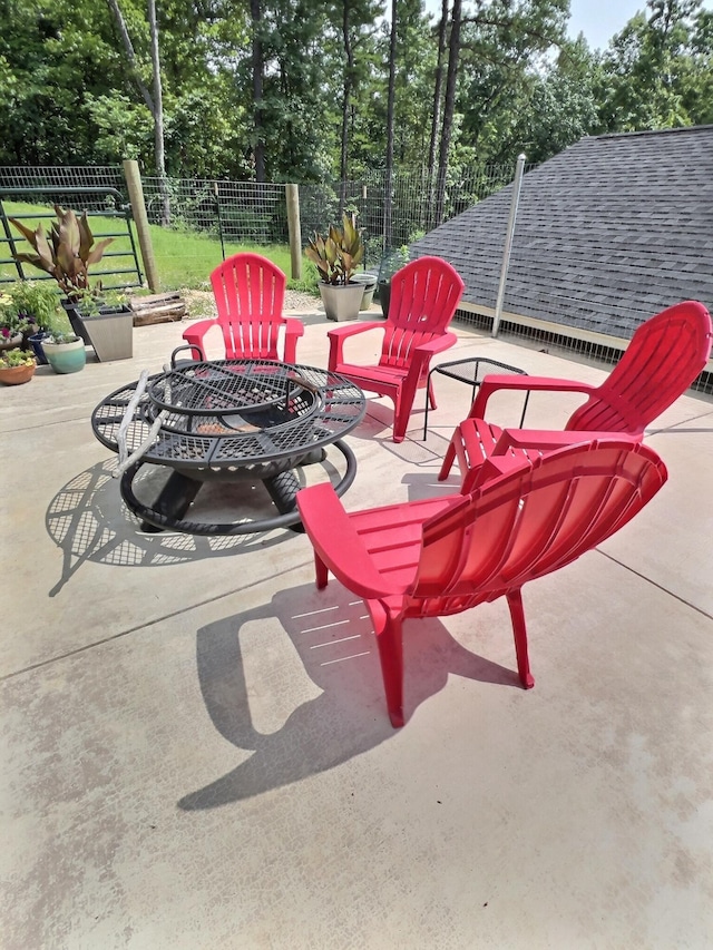 view of patio / terrace with a fire pit