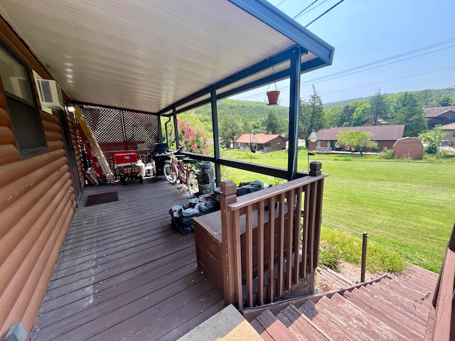 deck featuring a lawn