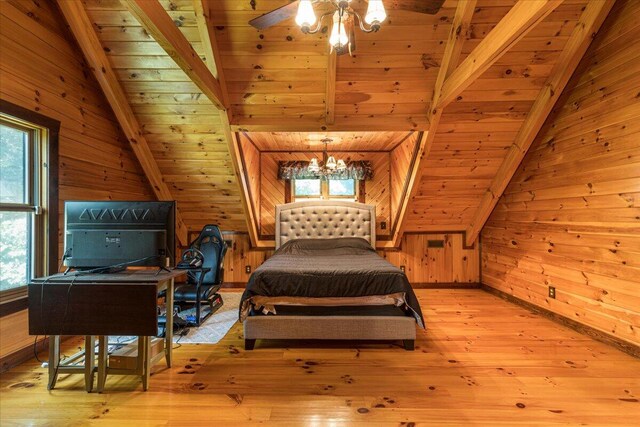 bedroom with light wood-style flooring, wood walls, and lofted ceiling with beams