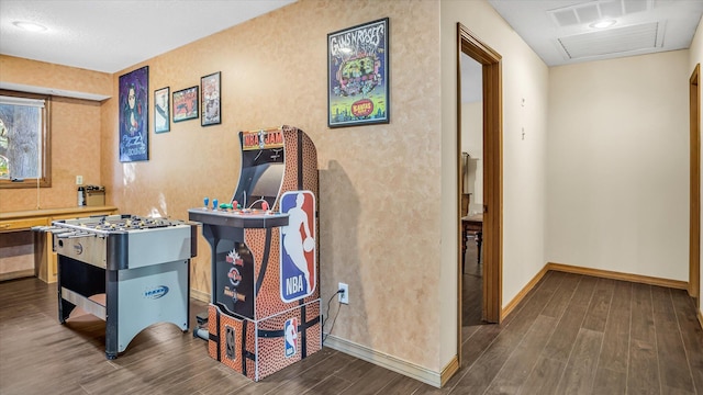 3166 W Seminole St, Springfield, MO 65807 - playroom with wood finished floors and baseboards