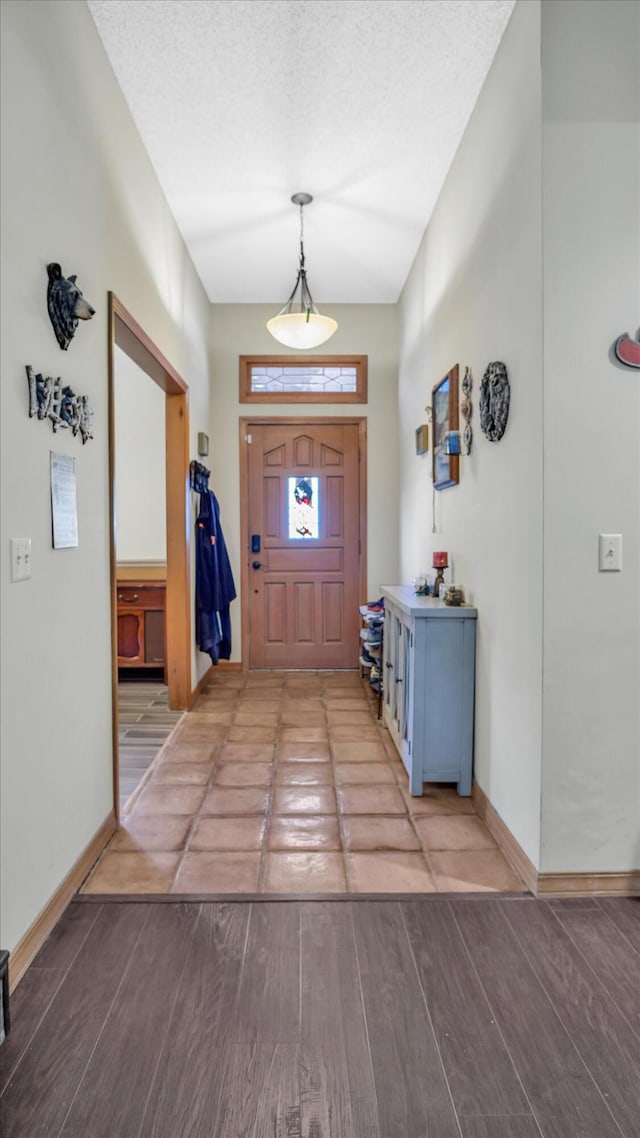 3166 W Seminole St, Springfield, MO 65807 - foyer featuring wood finished floors and baseboards