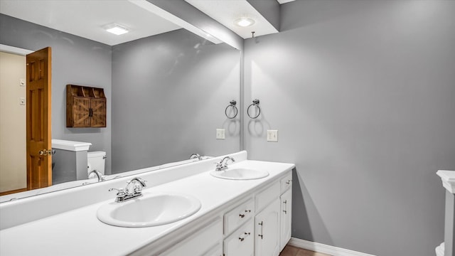 3166 W Seminole St, Springfield, MO 65807 - bathroom with toilet and double vanity