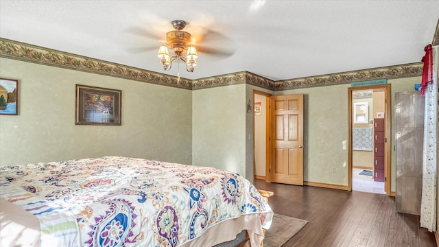 3166 W Seminole St, Springfield, MO 65807 - bedroom with wood finished floors, ceiling fan, and baseboards