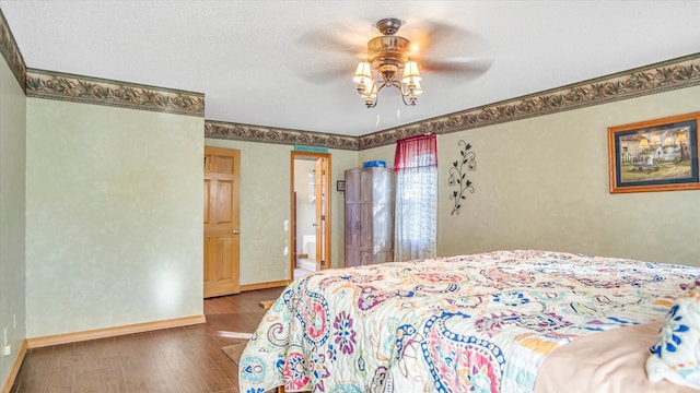 3166 W Seminole St, Springfield, MO 65807 - bedroom featuring wood finished floors, baseboards, and ceiling fan