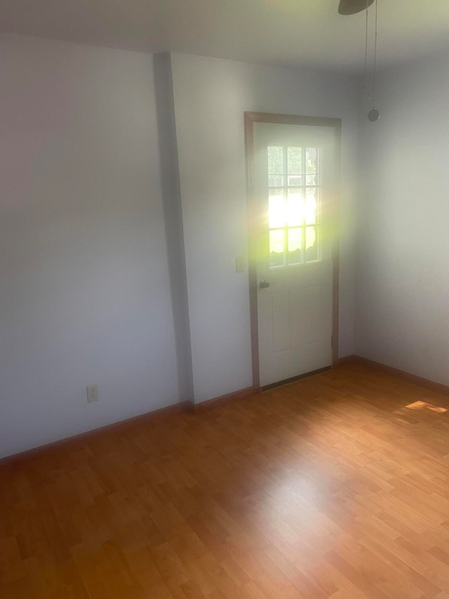 spare room featuring hardwood / wood-style floors