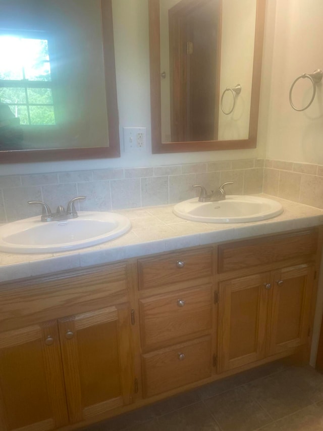 bathroom featuring tile patterned floors and vanity