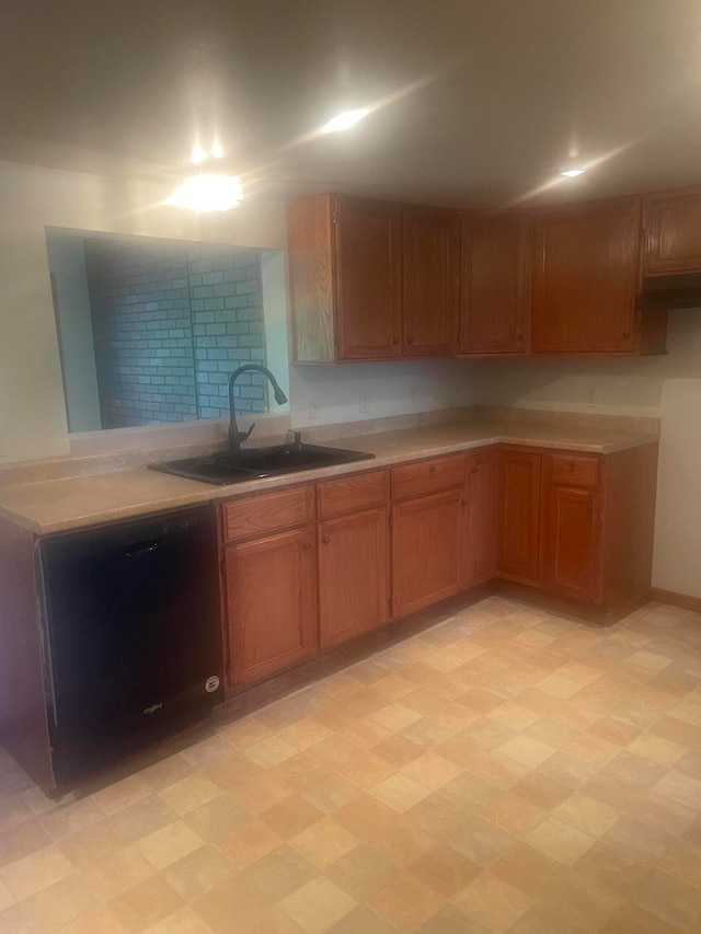 kitchen featuring dishwasher and sink