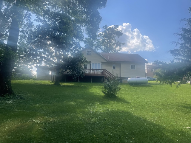 view of yard featuring a wooden deck