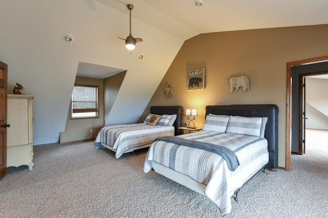 carpeted bedroom featuring lofted ceiling and ceiling fan