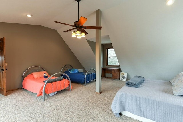 carpeted bedroom with lofted ceiling and ceiling fan