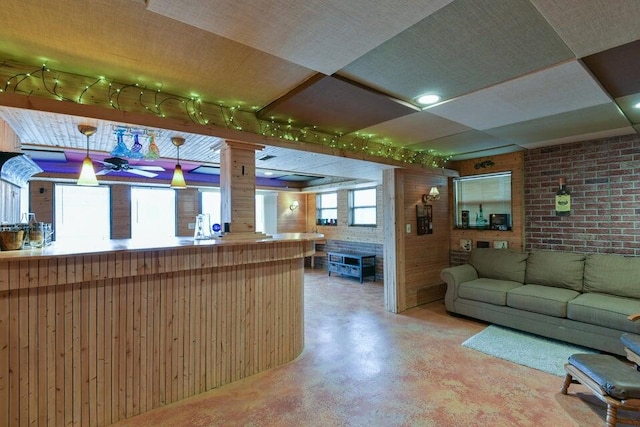 reception featuring decorative columns and indoor bar