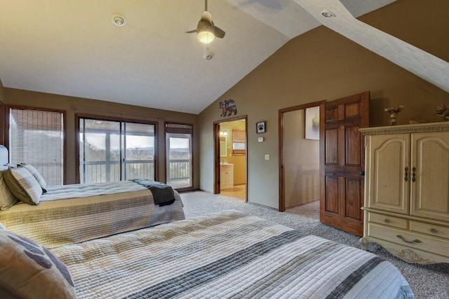 carpeted bedroom featuring lofted ceiling, ceiling fan, connected bathroom, and access to exterior