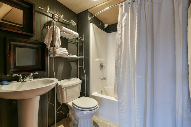 bathroom with toilet and shower / bath combo