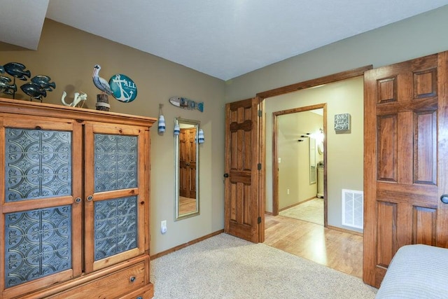 bedroom featuring light hardwood / wood-style flooring