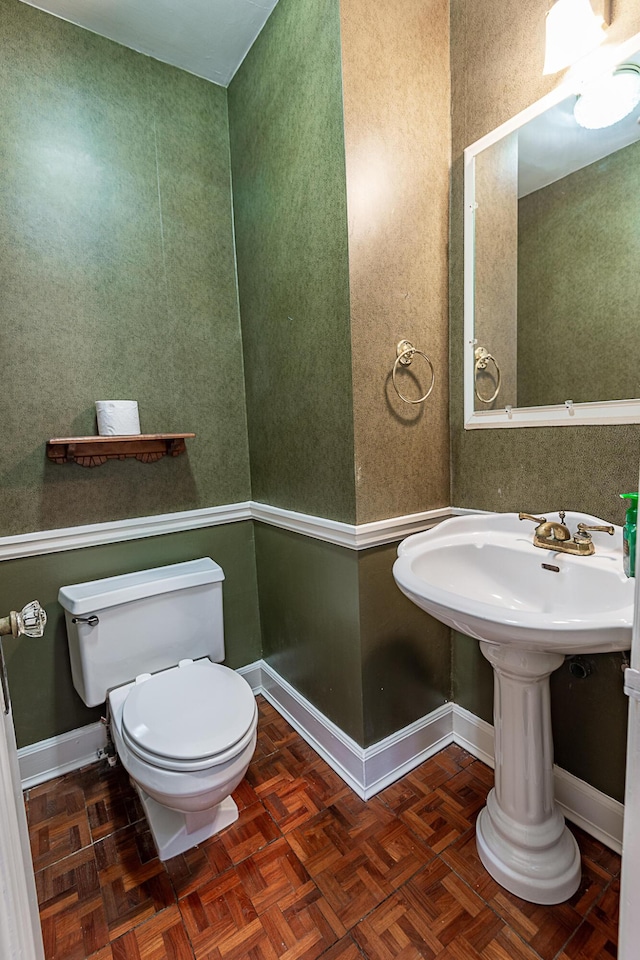 1011 E University St, Springfield, MO 65807 - half bathroom with toilet and baseboards