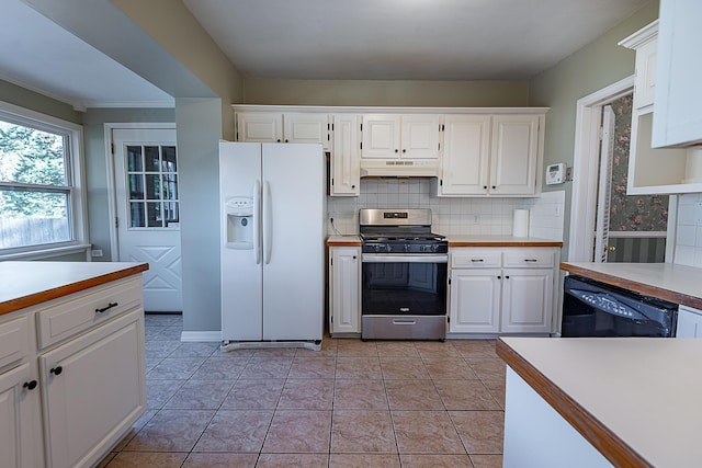 1011 E University St, Springfield, MO 65807 - kitchen with gas stove, white refrigerator with ice dispenser, dishwasher, under cabinet range hood, and light countertops