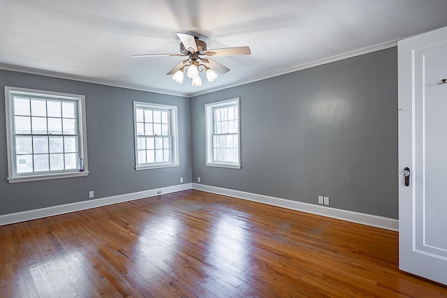 1011 E University St, Springfield, MO 65807 - unfurnished room with wood finished floors, ornamental molding, and ceiling fan