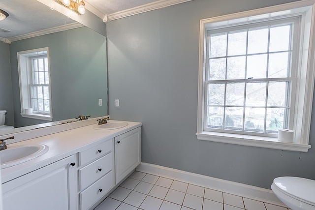 1011 E University St, Springfield, MO 65807 - bathroom featuring ornamental molding, tile patterned flooring, and double vanity