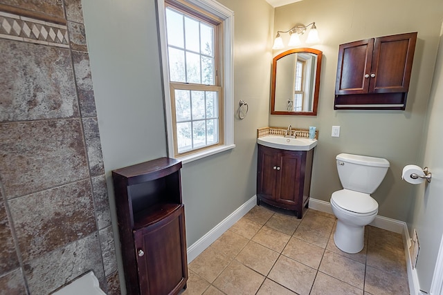 1011 E University St, Springfield, MO 65807 - full bathroom featuring vanity, tile patterned floors, and a shower