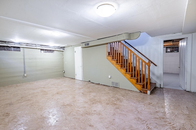 1011 E University St, Springfield, MO 65807 - finished basement featuring stairway