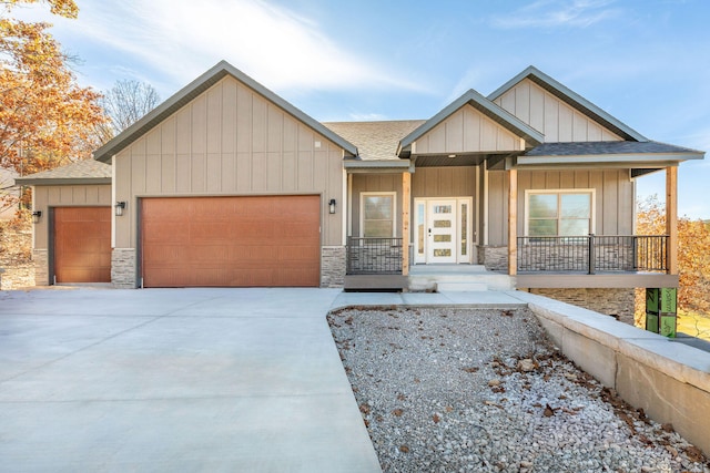 craftsman-style home featuring a garage and a porch