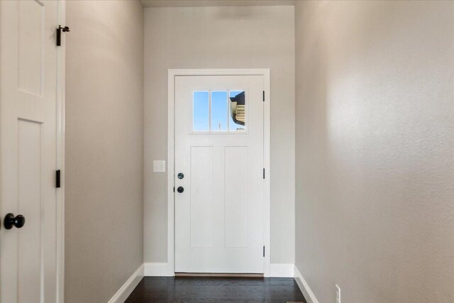 entryway featuring dark wood-type flooring