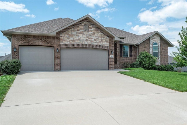 1641 N Pinnacle Ave, Nixa, MO 65714 - view of front of house with concrete driveway, brick siding, an attached garage, a shingled roof, and a front yard