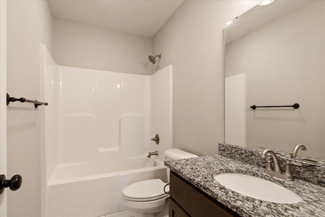 full bathroom with shower / tub combination, vanity, and toilet