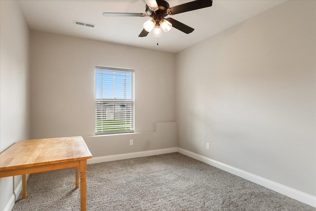 carpeted empty room with ceiling fan