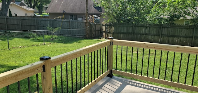 deck featuring a lawn