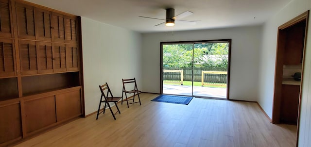 entryway with light wood-type flooring and ceiling fan