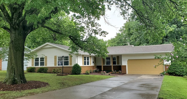 ranch-style house with a front lawn and a garage