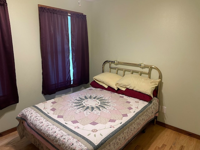 bedroom featuring light wood-type flooring