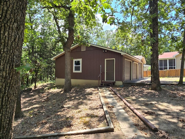 exterior space with a garage