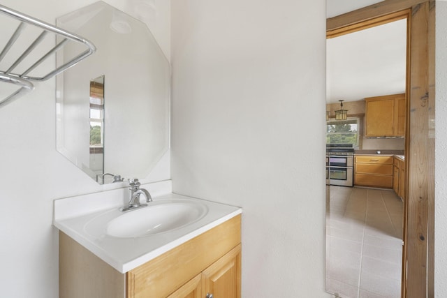 bathroom featuring vanity and tile patterned flooring