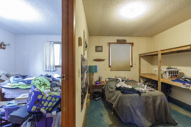 carpeted bedroom with a textured ceiling