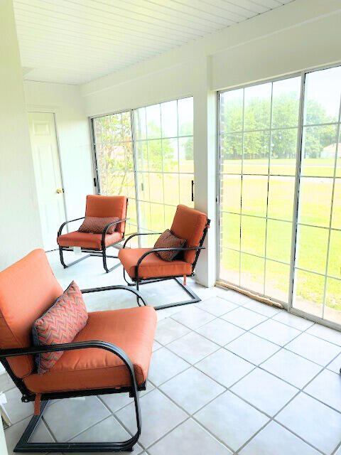 sunroom with plenty of natural light