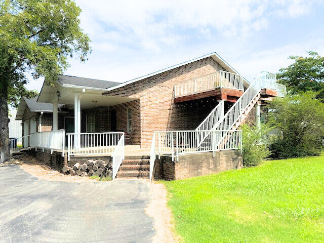 view of front of home with a front yard