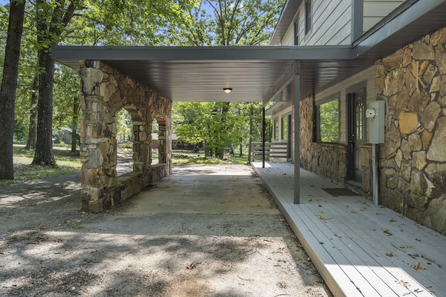 view of patio / terrace featuring a carport