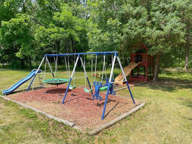 communal playground featuring a yard