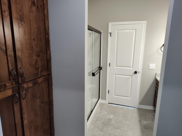 bathroom with vanity and walk in shower