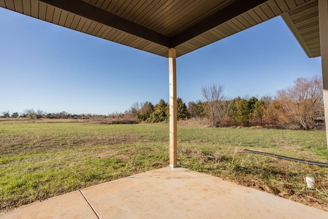 view of patio with a rural view